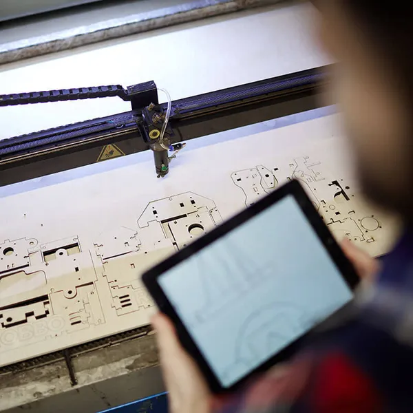 CONTRAXT laser-cut wooden gifts being crafted